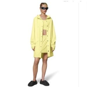 RAINS.   Inner drawstring CLASSY rain coat nwot. Xs/S